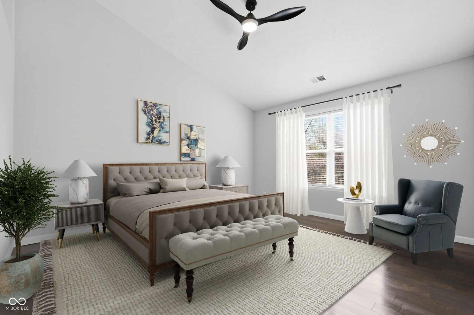 Spacious primary bedroom with French doors and balcony access.