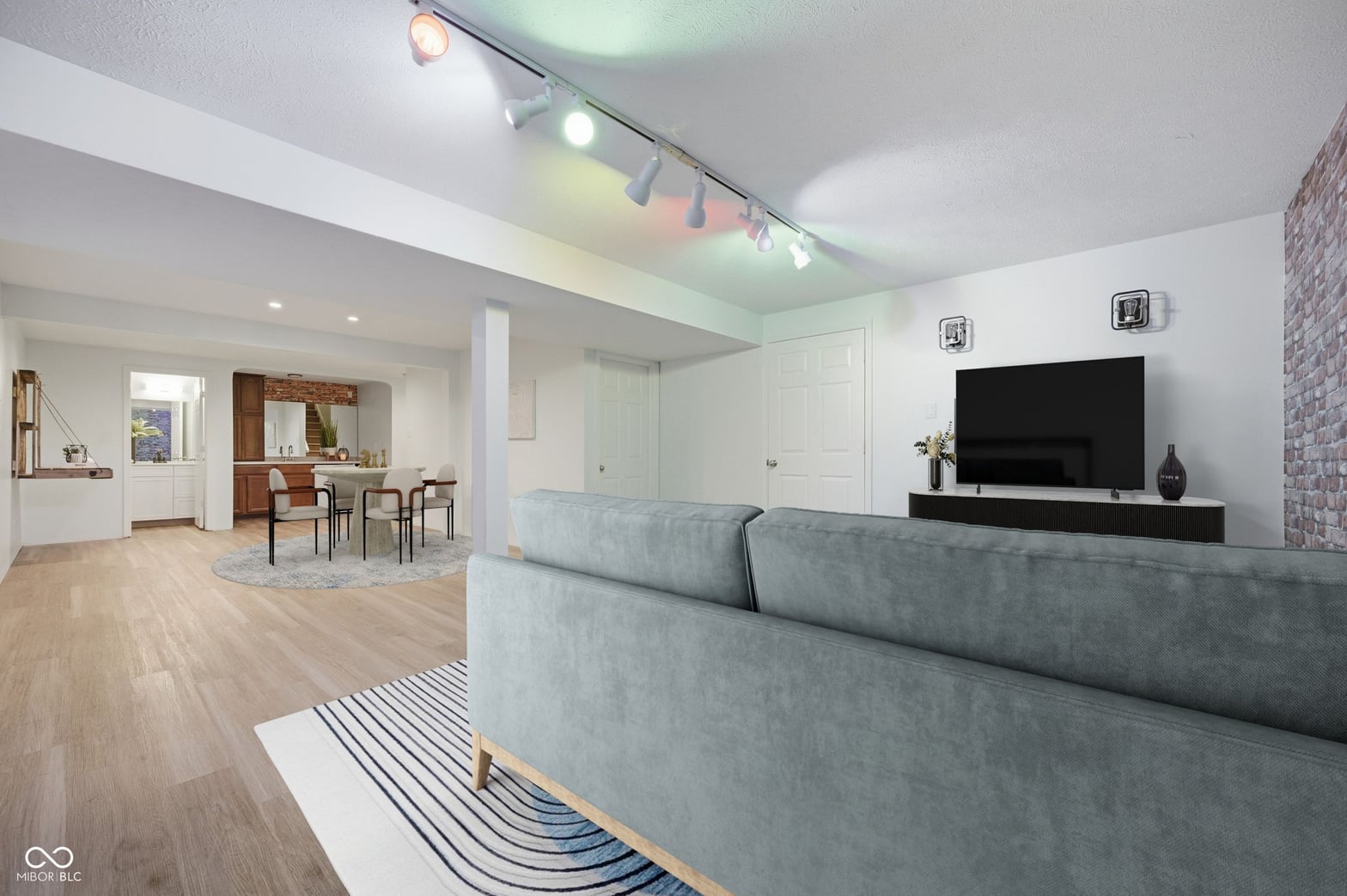 Modern renovated open-concept living space with premium finishes.