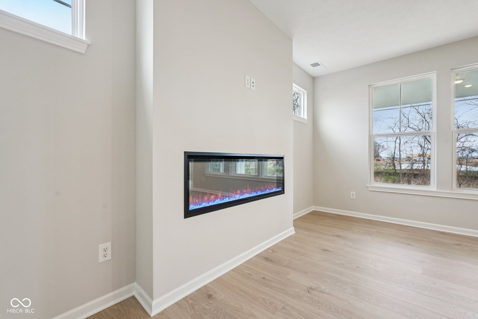 Modern living space with stylish electric fireplace.