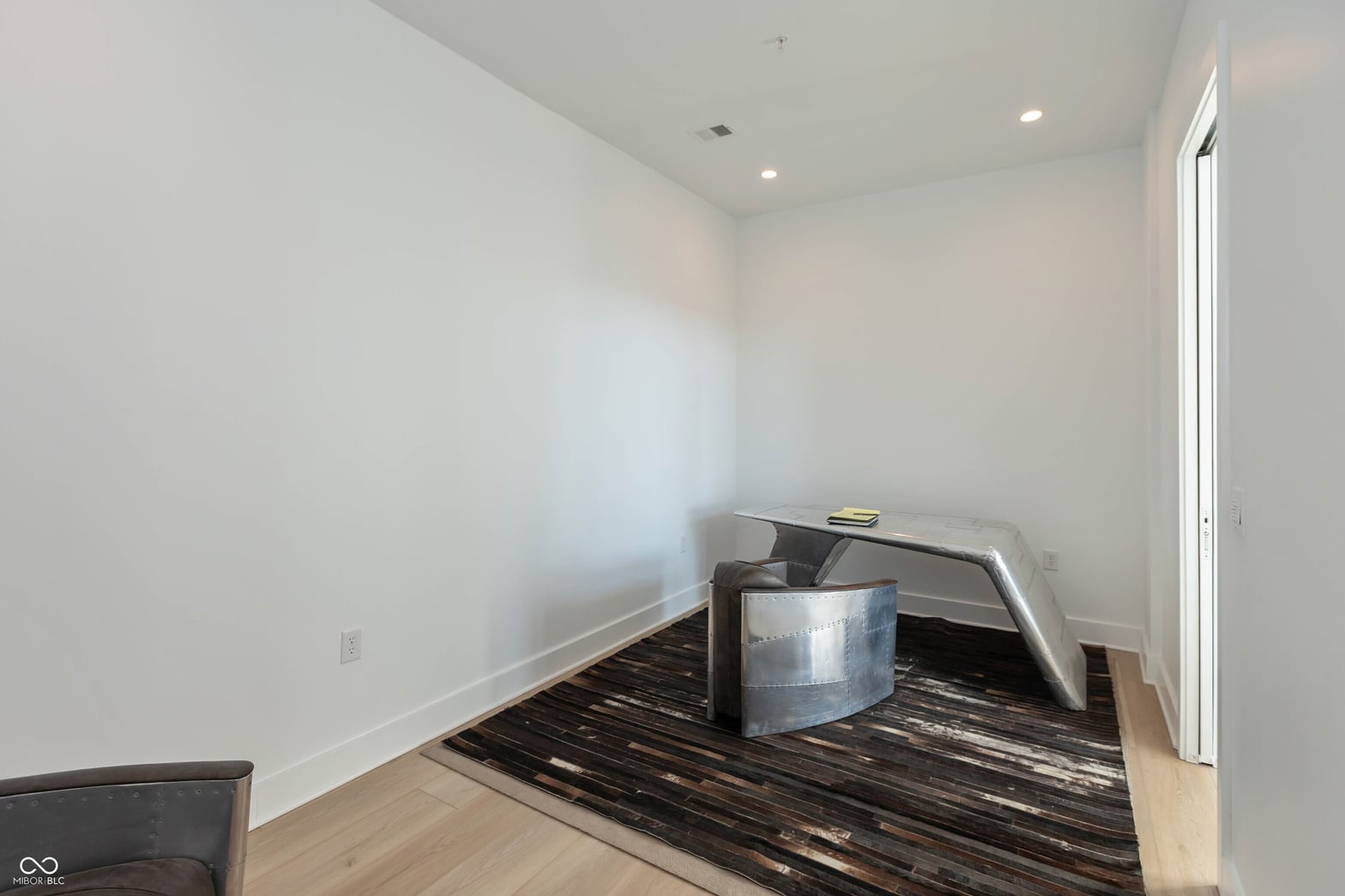 Bright, minimalist office space with modern finishes.