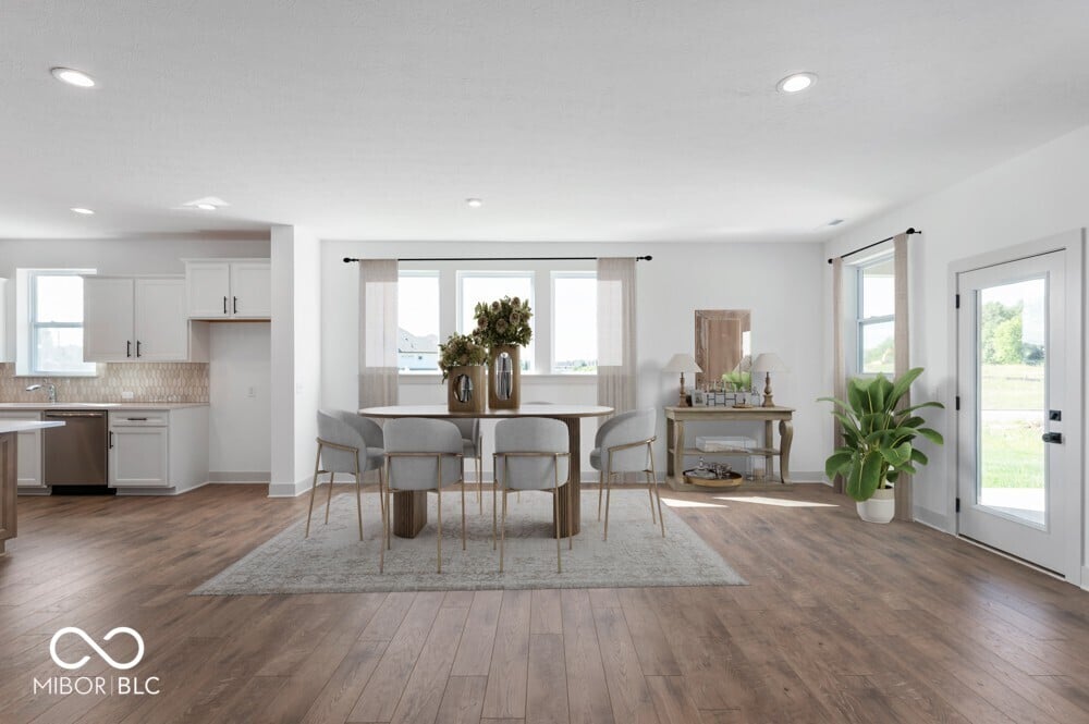 Bright open-concept living with hardwood floors and natural light.