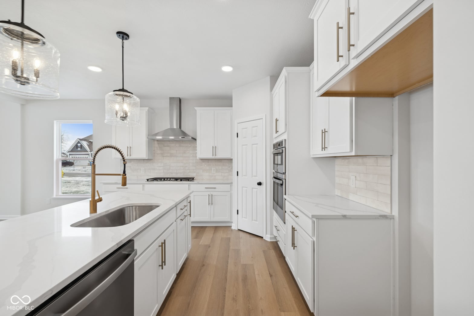 Bright modern kitchen with premium appliances and finishes