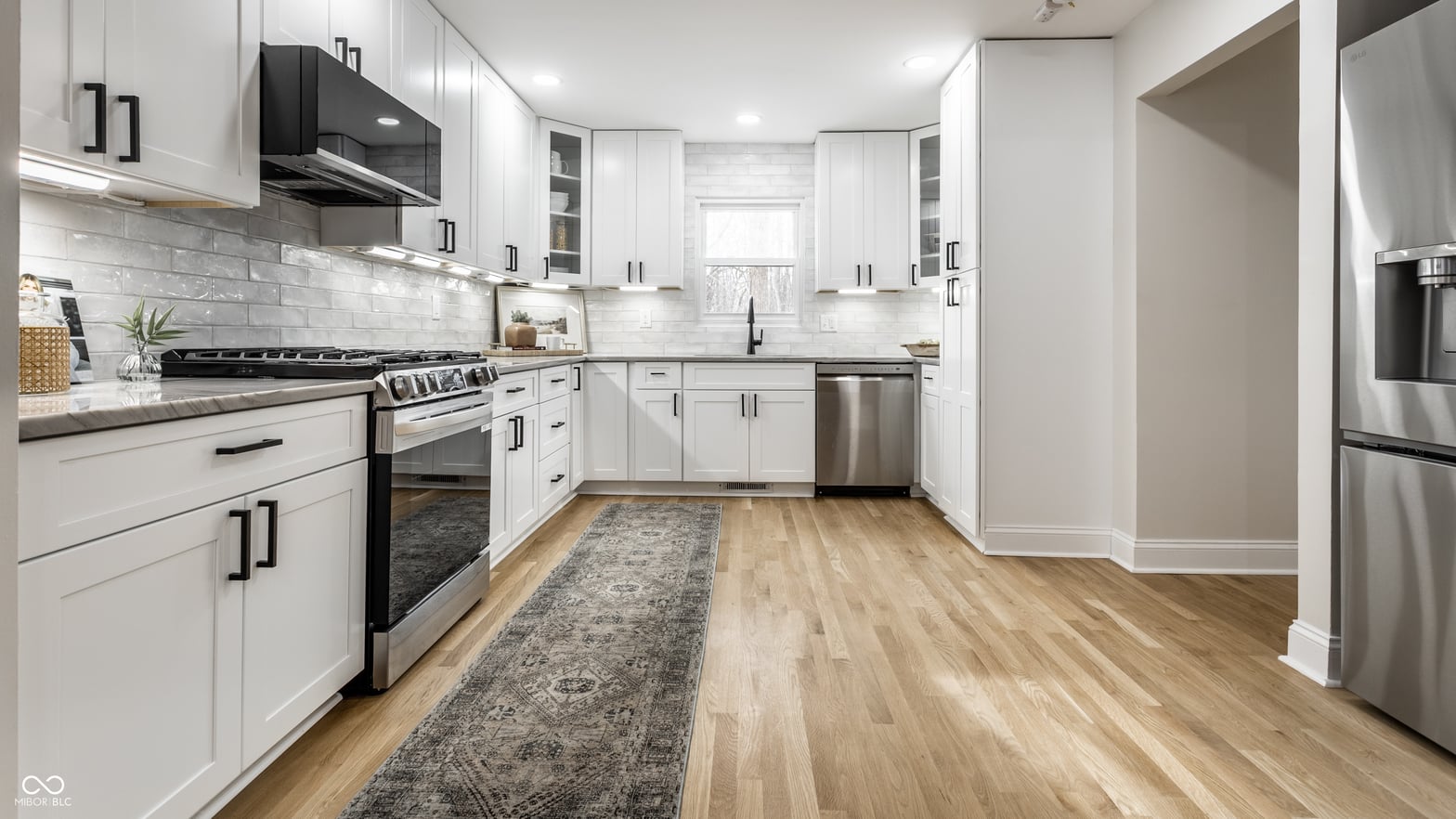 Modern renovated kitchen with premium finishes throughout.