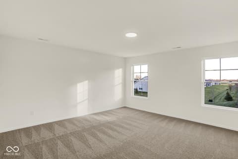Bedroom at 1353 Mahoning Road, Sheridan, IN — Bright bedroom with expansive windows and modern finishes.