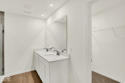 Primary bathroom at 1353 Mahoning Road, Sheridan, IN — Spacious primary bath with dual vanity and modern finishes.