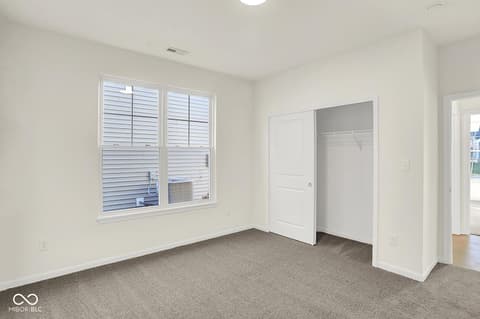 Bedroom at 19773 Highclere Lane, Sheridan, IN — Spacious bedroom with dual closets and natural light