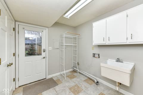 Primary bathroom at 13035 Wembly Road, Carmel, IN — Spacious primary bath with walk-in shower and natural light.
