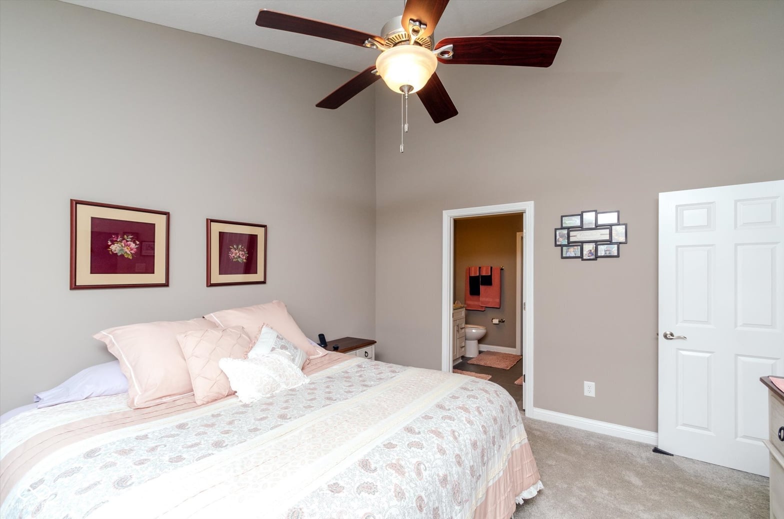 Spacious primary bedroom with ensuite bathroom access.