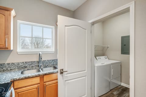 Laundry room at 12926 University Crescent, Carmel, IN