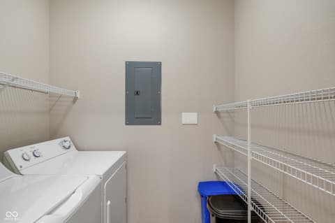 Laundry room at 12926 University Crescent, Carmel, IN