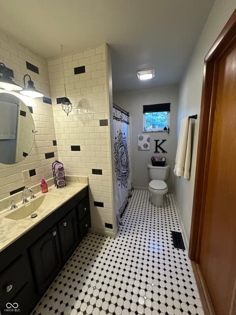 Bathroom at 144 W Sycamore Lane, Rushville, IN