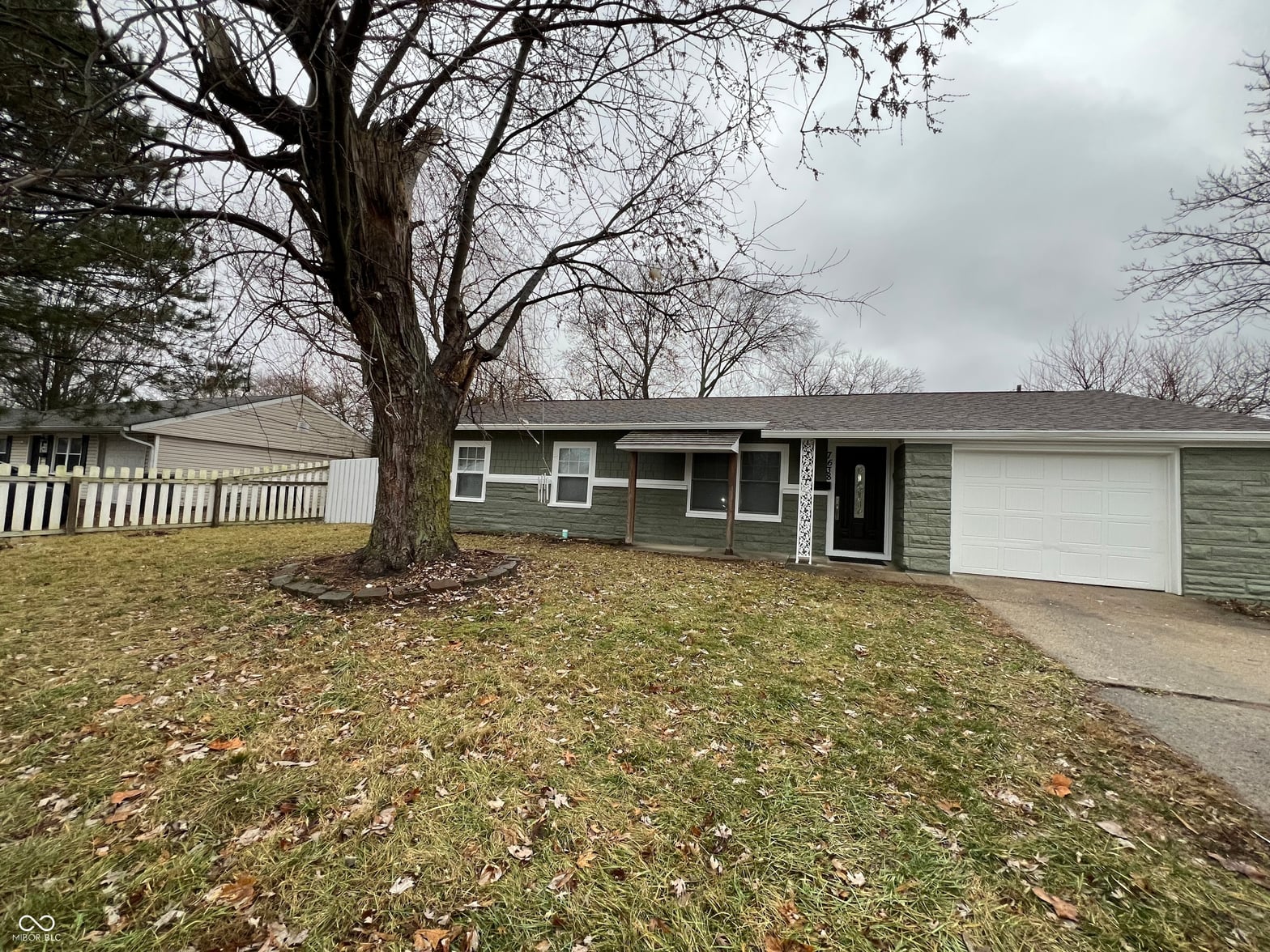 Front exterior at 7638 E 37th Place, Indianapolis, IN