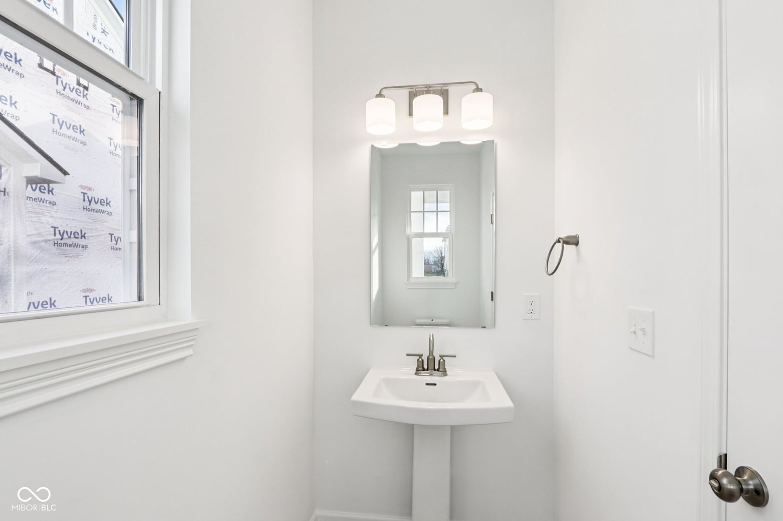 Bright, clean bathroom with modern fixtures and finishes.