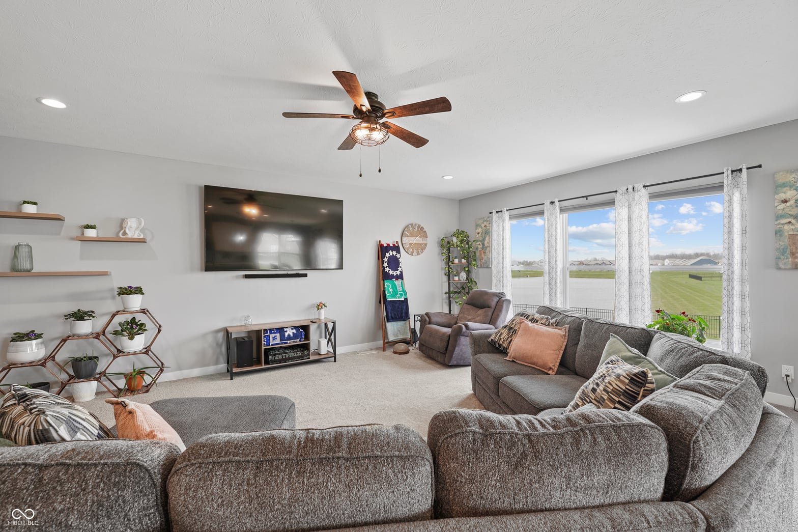 Spacious family room with panoramic rural views.