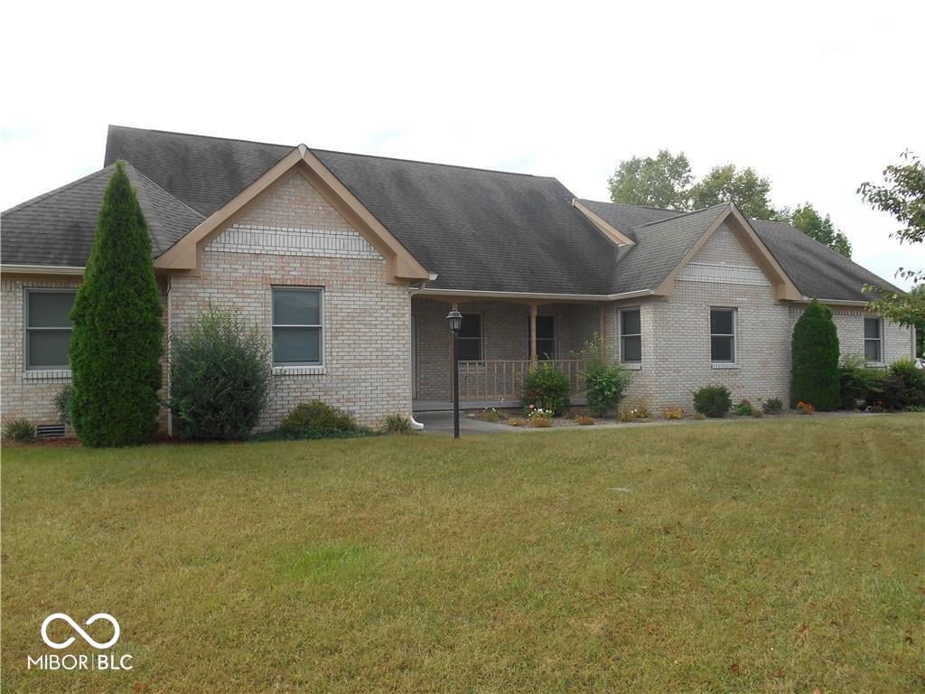 Front exterior at 7405 Rooses Drive, Indianapolis, IN