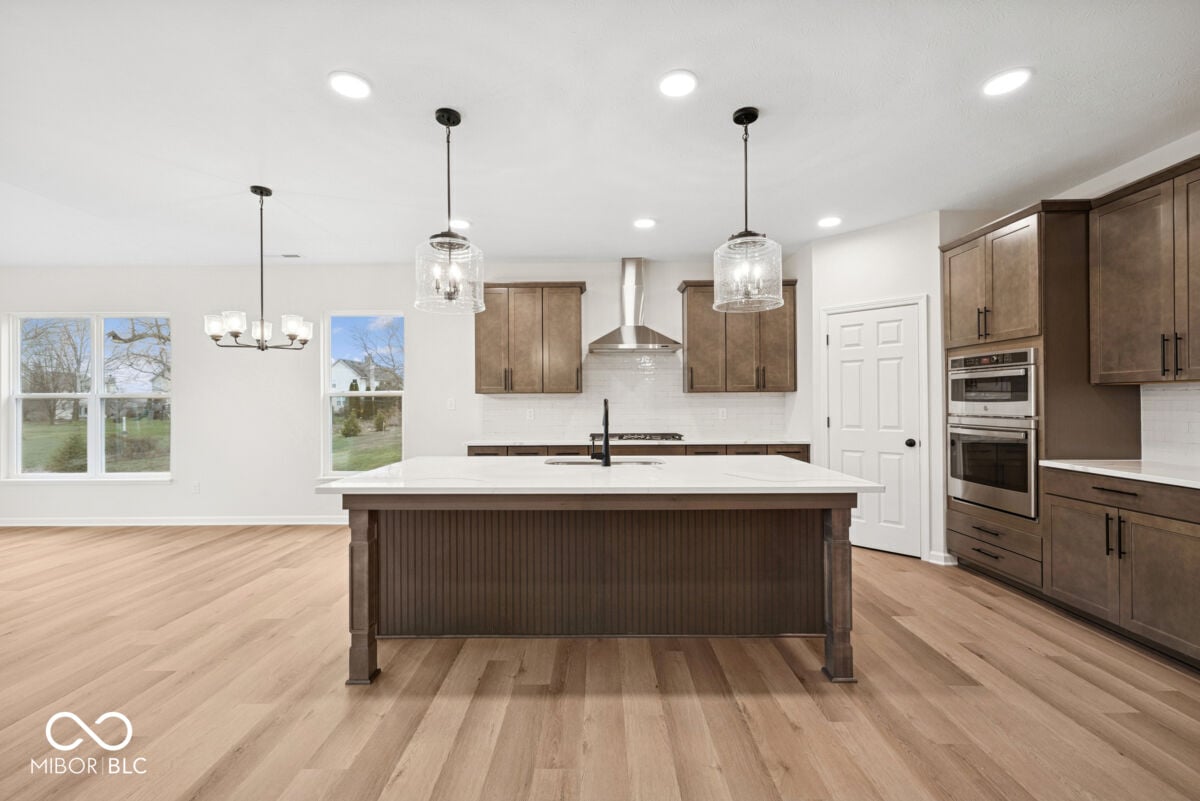 Bright open kitchen with premium finishes and natural light.