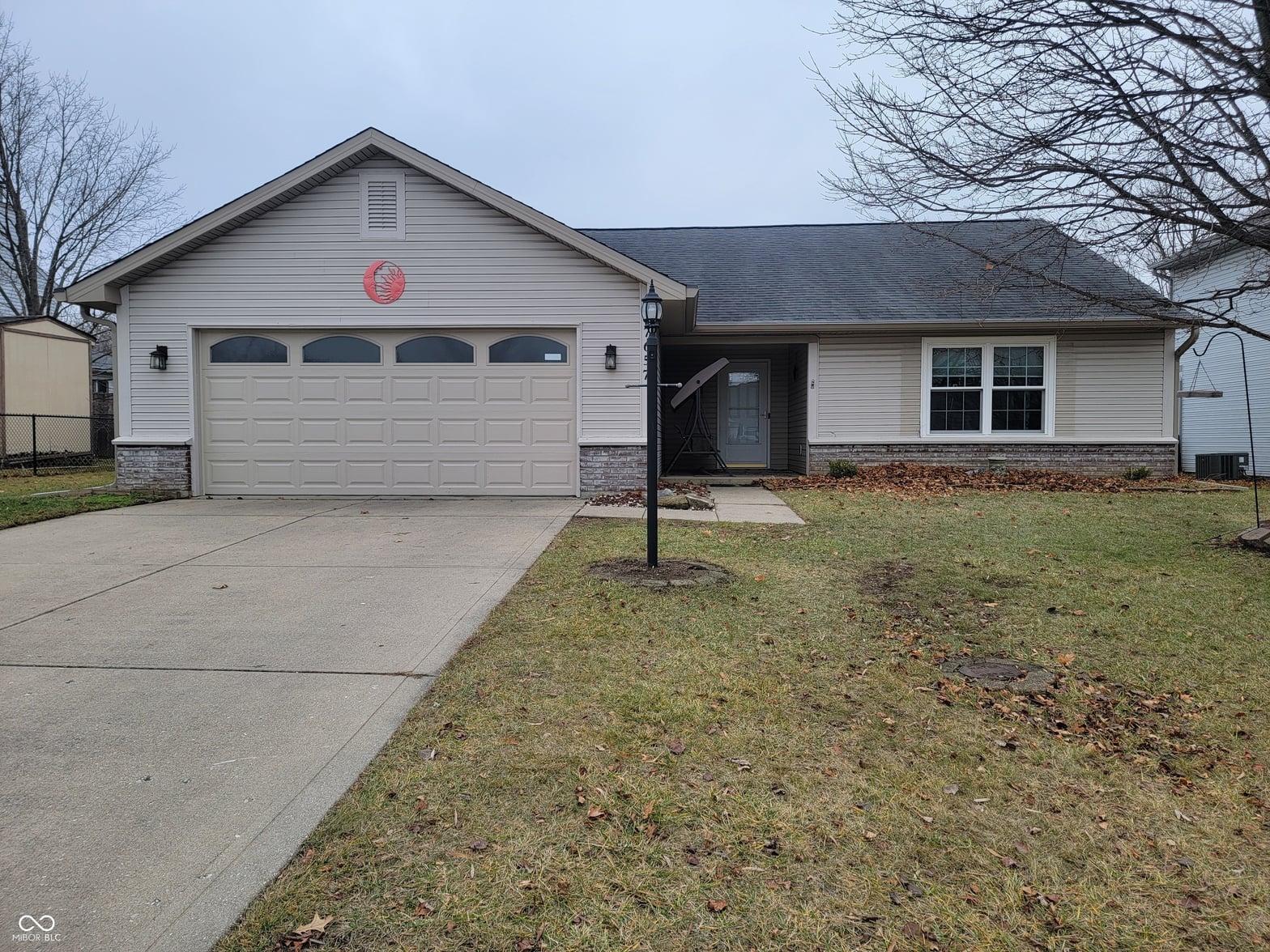 Front exterior at 7657 Scatter Woods Lane, Indianapolis, IN