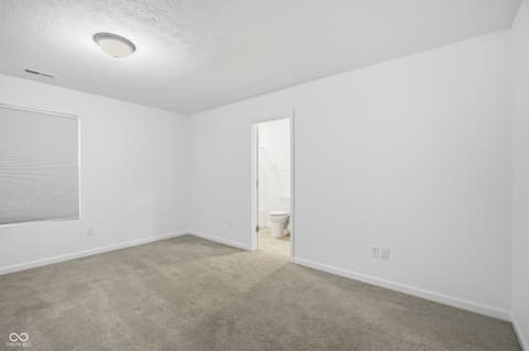 Primary bedroom at 296 Evening Bay Court, Pendleton, IN