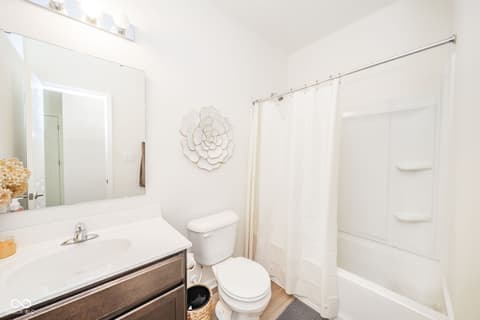 Primary bathroom at 16592 Branham Drive, Fishers, IN — Bright, clean primary bath with updated fixtures.
