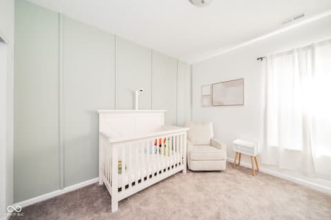 Bedroom at 16592 Branham Drive, Fishers, IN — Bright, modern nursery with calming neutral tones.