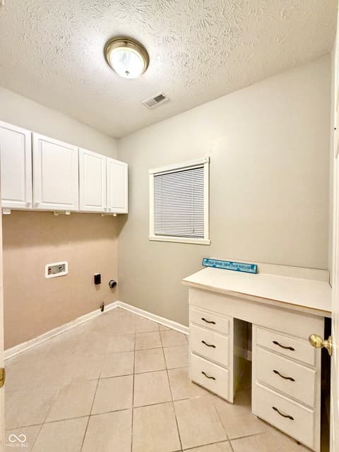 Laundry room at 2019 Woodfield Drive, Greenwood, IN
