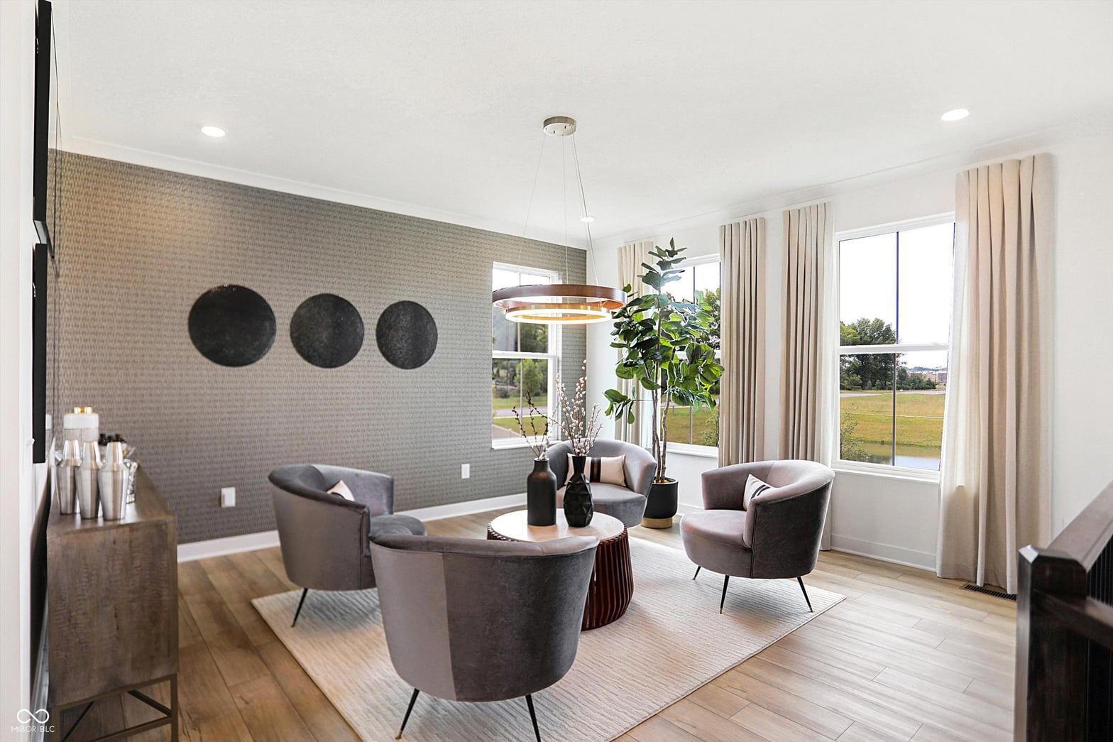 Bright contemporary living with expansive windows and modern finishes.