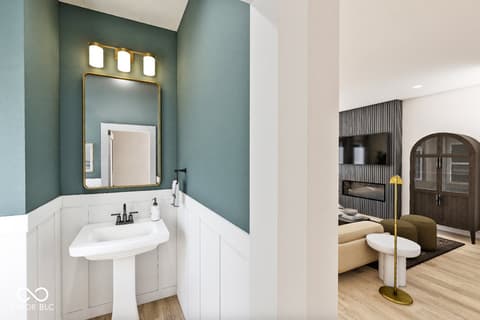 Primary bathroom at 9894 Cassia Drive, Carmel, IN — Elegant updated bath with teal walls and brass accents.