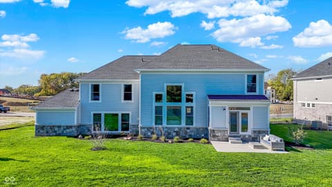 Front exterior at 1560 Old Hickory Lane, Westfield, IN — Stunning new modern home with stylish stone accents.