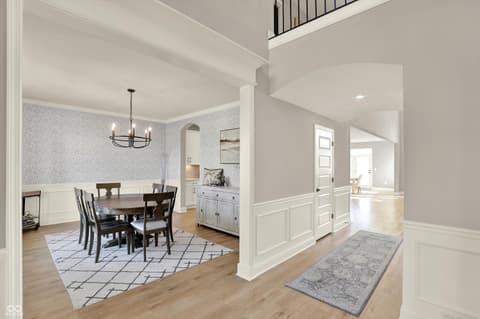 Dining room at 1560 Old Hickory Lane, Westfield, IN — Elegant dining with wainscoting and open-concept flow.