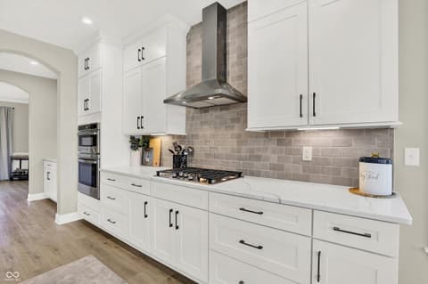 Kitchen at 1560 Old Hickory Lane, Westfield, IN — Bright modern kitchen with premium appliances and finishes.