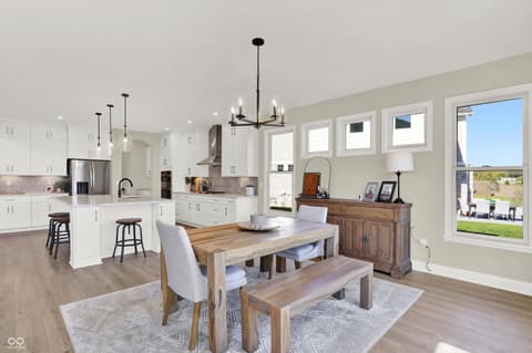 Kitchen at 1560 Old Hickory Lane, Westfield, IN — Bright open-concept kitchen with island and dining area.