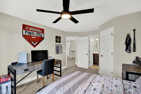 Bedroom at 1560 Old Hickory Lane, Westfield, IN — Spacious bedroom with vaulted ceiling and work area.