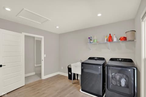 Laundry room at 1560 Old Hickory Lane, Westfield, IN — Modern laundry room with new high-capacity appliances.