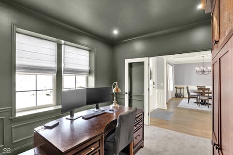 Home office at 1560 Old Hickory Lane, Westfield, IN — Sophisticated home office with elegant sage green walls.