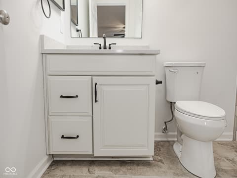 Primary bathroom at 12517 Timber Creek Drive, Carmel, IN — Clean, modern primary bath with updated white vanity.