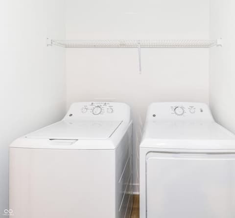 Laundry room at 6959 Equality Boulevard, Carmel, IN — Dedicated laundry room with matching washer and dryer.