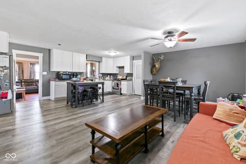 Family room at 8440 E 216th Street, Cicero, IN — Spacious open-concept kitchen, dining, and family room.