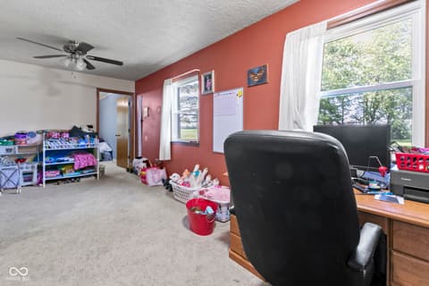 Bedroom at 8440 E 216th Street, Cicero, IN — Spacious bedroom with abundant natural light and windows.
