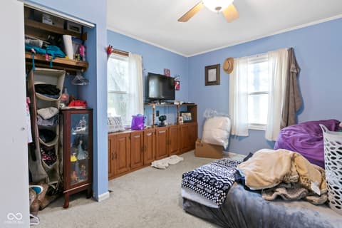 Bedroom at 8440 E 216th Street, Cicero, IN — Spacious bedroom with natural light and ample storage.