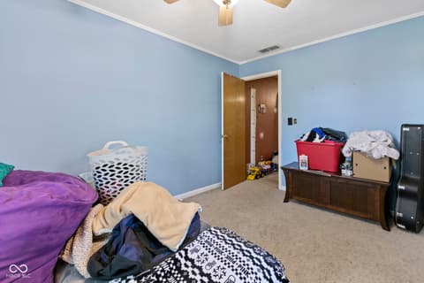 Bedroom at 8440 E 216th Street, Cicero, IN — Spacious bedroom with good natural lighting and storage.