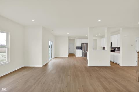 Living room at 3932 E 191st Street, Westfield, IN — Bright open-concept living space with modern finishes.