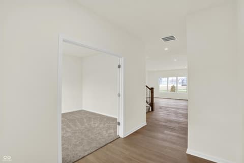 Primary bedroom at 3932 E 191st Street, Westfield, IN — Spacious primary bedroom with luxe walk-in closet.