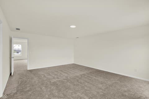Bonus room at 3932 E 191st Street, Westfield, IN — Spacious bonus room with new carpet and clean finishes.