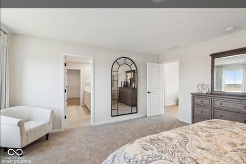 Primary bedroom at 3932 E 191st Street, Westfield, IN — Spacious primary suite with walk-in closet and en-suite.