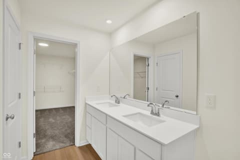 Primary bathroom at 3932 E 191st Street, Westfield, IN — Spacious primary bath with dual vanity and walk-in shower.