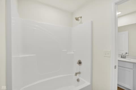 Primary bathroom at 3932 E 191st Street, Westfield, IN — Clean updated primary bath with tub/shower combo.