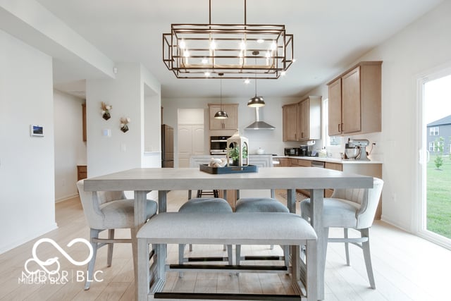 Bright open-concept kitchen with large island and yard access.