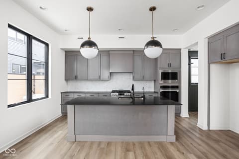 Kitchen at 1678 Coach Drive, Westfield, IN — Modern kitchen with premium finishes and large island.