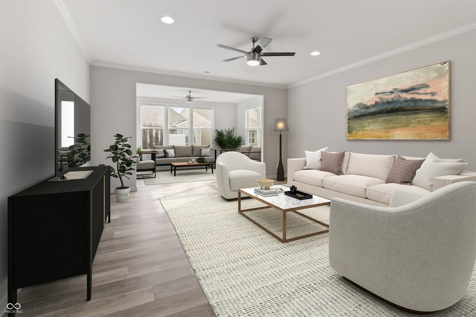 Bright contemporary living room with curved sectional and marble accents.