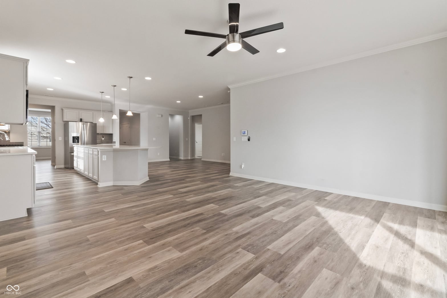 Bright open concept living space with premium finishes.